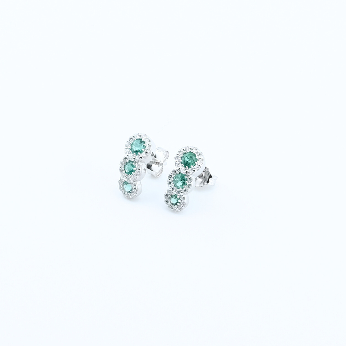 Orecchini trilogy con Diamanti e Smeraldo
